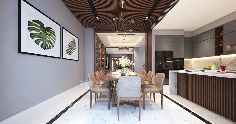 Bộ bàn ghế ăn 8 ghế gỗ óc chó cao cấp cùng chất liệu nệm bọc êm ái được trang trí tối giản giúp không gian trở nên thông thoáng nhưng không kém phần hiện đại, sang trọng. Thiết kế phòng ăn biệt thự